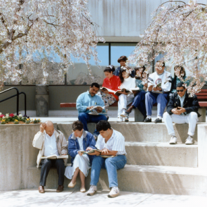 Students seated outside of 45 Franklin Street, 1990s.