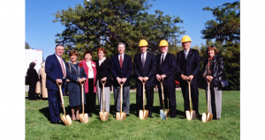 Administrators with shovels and construction hats at the Technology Center Groundbreaking, 2002.